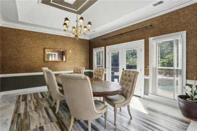 Tucked in Atlanta Country Club's quiet interior, this European on Atlanta Country Club in Georgia - for sale on GolfHomes.com, golf home, golf lot