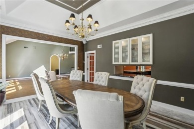 Tucked in Atlanta Country Club's quiet interior, this European on Atlanta Country Club in Georgia - for sale on GolfHomes.com, golf home, golf lot