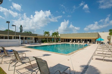 Beautifully updated first-floor unit with golf views! Desirable on The American Golf Club in Florida - for sale on GolfHomes.com, golf home, golf lot