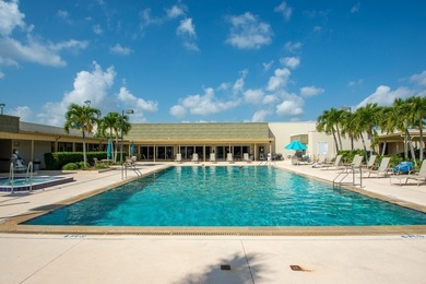 Beautifully updated first-floor unit with golf views! Desirable on The American Golf Club in Florida - for sale on GolfHomes.com, golf home, golf lot