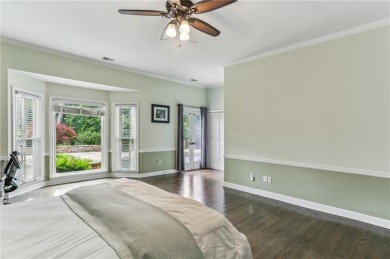 Tucked in Atlanta Country Club's quiet interior, this European on Atlanta Country Club in Georgia - for sale on GolfHomes.com, golf home, golf lot