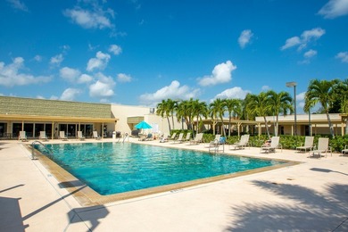 Beautifully updated first-floor unit with golf views! Desirable on The American Golf Club in Florida - for sale on GolfHomes.com, golf home, golf lot