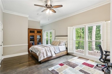 Tucked in Atlanta Country Club's quiet interior, this European on Atlanta Country Club in Georgia - for sale on GolfHomes.com, golf home, golf lot
