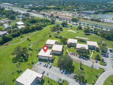 Beautifully updated first-floor unit with golf views! Desirable on The American Golf Club in Florida - for sale on GolfHomes.com, golf home, golf lot