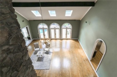 Tucked in Atlanta Country Club's quiet interior, this European on Atlanta Country Club in Georgia - for sale on GolfHomes.com, golf home, golf lot