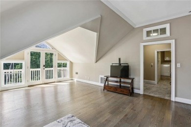 Tucked in Atlanta Country Club's quiet interior, this European on Atlanta Country Club in Georgia - for sale on GolfHomes.com, golf home, golf lot