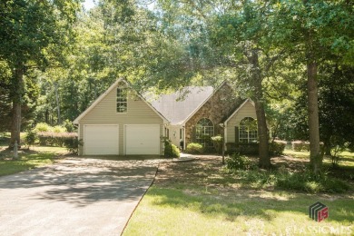 This warm & welcoming 3 bedroom/2 bathroom ranch home is nestled on Bear Creek Golf Club Inc in Georgia - for sale on GolfHomes.com, golf home, golf lot