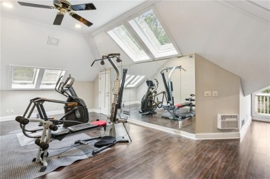 Tucked in Atlanta Country Club's quiet interior, this European on Atlanta Country Club in Georgia - for sale on GolfHomes.com, golf home, golf lot
