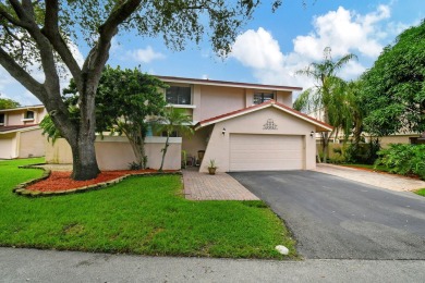 Stunning two story single family home nestled in the sought on Deer Creek Golf Club in Florida - for sale on GolfHomes.com, golf home, golf lot