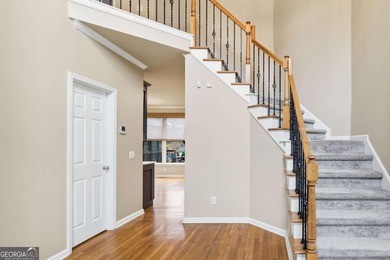 Don't miss the opportunity to own this gem in Towne Lake Hills on Towne Lake Hills Golf Club in Georgia - for sale on GolfHomes.com, golf home, golf lot