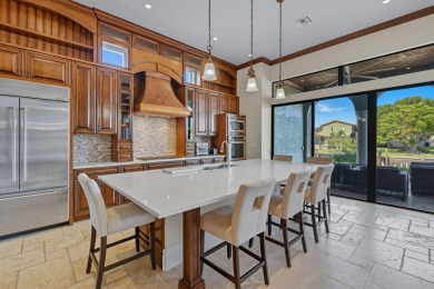 This stunning waterfront residence offers direct Gulf access on Island Country Club in Florida - for sale on GolfHomes.com, golf home, golf lot