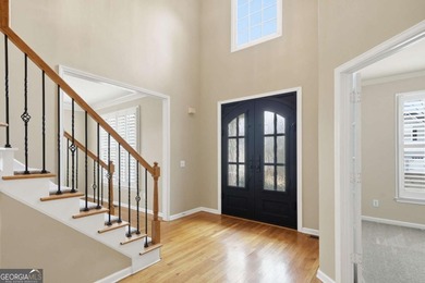 Don't miss the opportunity to own this gem in Towne Lake Hills on Towne Lake Hills Golf Club in Georgia - for sale on GolfHomes.com, golf home, golf lot