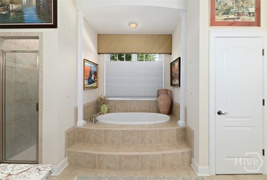 Unparalleled custom finishes, spacious rooms and an open concept on Savannah Quarters Country Club in Georgia - for sale on GolfHomes.com, golf home, golf lot