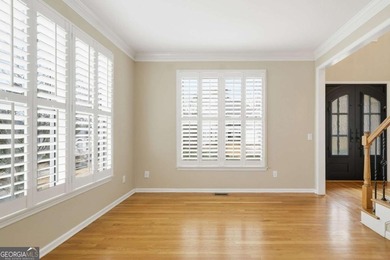 Don't miss the opportunity to own this gem in Towne Lake Hills on Towne Lake Hills Golf Club in Georgia - for sale on GolfHomes.com, golf home, golf lot