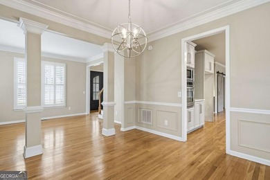 Don't miss the opportunity to own this gem in Towne Lake Hills on Towne Lake Hills Golf Club in Georgia - for sale on GolfHomes.com, golf home, golf lot