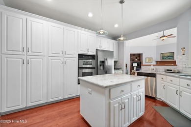 Custom built brick home located on a cul-de-sac lot that offers on Sound Golf Links at Albemarle Plantation in North Carolina - for sale on GolfHomes.com, golf home, golf lot