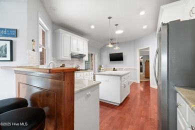 Custom built brick home located on a cul-de-sac lot that offers on Sound Golf Links at Albemarle Plantation in North Carolina - for sale on GolfHomes.com, golf home, golf lot