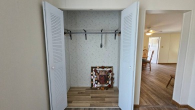 Welcome to your perfect retirement oasis in the charming city of on Herons Glen Golf and Country Club in Florida - for sale on GolfHomes.com, golf home, golf lot