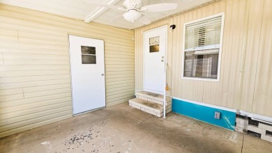Welcome to your perfect retirement oasis in the charming city of on Herons Glen Golf and Country Club in Florida - for sale on GolfHomes.com, golf home, golf lot