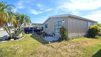 Welcome to your perfect retirement oasis in the charming city of on Herons Glen Golf and Country Club in Florida - for sale on GolfHomes.com, golf home, golf lot