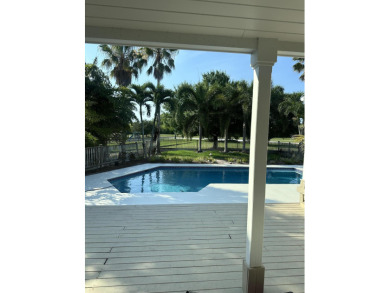 Welcome to one of Palm City's most charming Estate homes located on Martin Downs Country Club in Florida - for sale on GolfHomes.com, golf home, golf lot