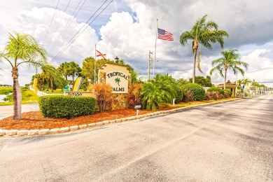 Welcome to your perfect retirement oasis in the charming city of on Herons Glen Golf and Country Club in Florida - for sale on GolfHomes.com, golf home, golf lot