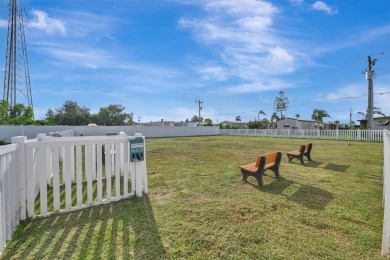Welcome to your perfect retirement oasis in the charming city of on Herons Glen Golf and Country Club in Florida - for sale on GolfHomes.com, golf home, golf lot