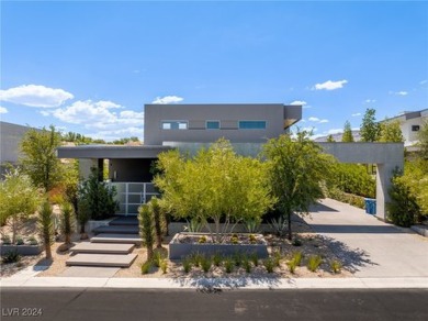 Architectural masterpiece features a warm aesthetic with wood on Bears Best Las Vegas Golf Club in Nevada - for sale on GolfHomes.com, golf home, golf lot