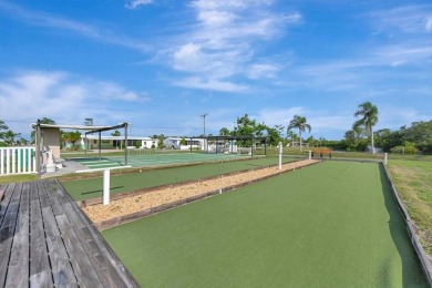 Welcome to your perfect retirement oasis in the charming city of on Herons Glen Golf and Country Club in Florida - for sale on GolfHomes.com, golf home, golf lot