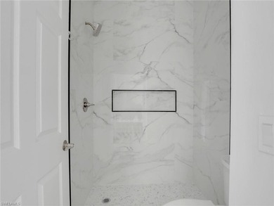 This exceptional three-bedroom, two-bathroom home in the on Lely Resort Golf and Country Club in Florida - for sale on GolfHomes.com, golf home, golf lot