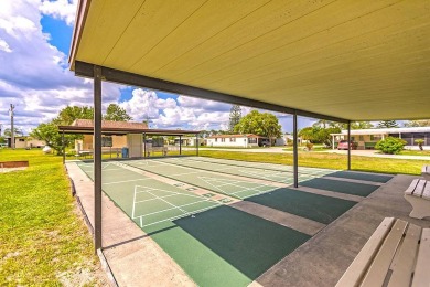 Welcome to your perfect retirement oasis in the charming city of on Herons Glen Golf and Country Club in Florida - for sale on GolfHomes.com, golf home, golf lot