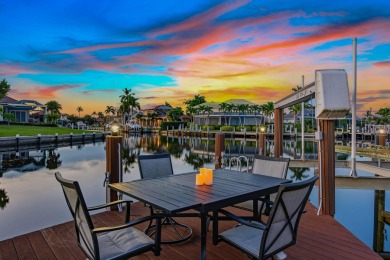 This stunning waterfront residence offers direct Gulf access on Island Country Club in Florida - for sale on GolfHomes.com, golf home, golf lot