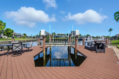This stunning waterfront residence offers direct Gulf access on Island Country Club in Florida - for sale on GolfHomes.com, golf home, golf lot