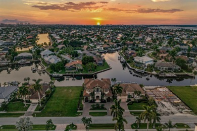 This stunning waterfront residence offers direct Gulf access on Island Country Club in Florida - for sale on GolfHomes.com, golf home, golf lot