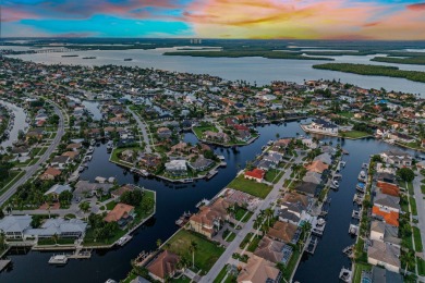 This stunning waterfront residence offers direct Gulf access on Island Country Club in Florida - for sale on GolfHomes.com, golf home, golf lot