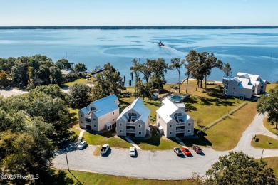 This beautifully updated two-bedroom, two-bath second-floor on Minnesott Golf and Country Club in North Carolina - for sale on GolfHomes.com, golf home, golf lot