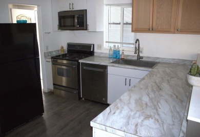 Incredible opportunity in Tri Palm Estates! This fresh 3-bedroom on The Club At Shenandoah Springs in California - for sale on GolfHomes.com, golf home, golf lot