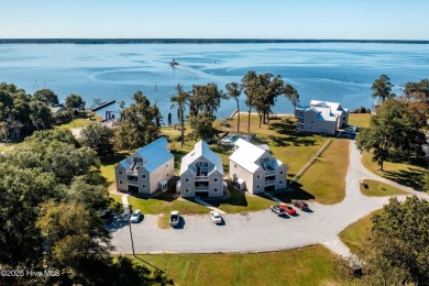 This beautifully updated two-bedroom, two-bath second-floor on Minnesott Golf and Country Club in North Carolina - for sale on GolfHomes.com, golf home, golf lot