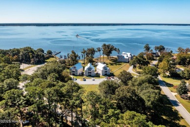 This beautifully updated two-bedroom, two-bath second-floor on Minnesott Golf and Country Club in North Carolina - for sale on GolfHomes.com, golf home, golf lot