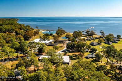 This beautifully updated two-bedroom, two-bath second-floor on Minnesott Golf and Country Club in North Carolina - for sale on GolfHomes.com, golf home, golf lot