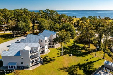 This beautifully updated two-bedroom, two-bath second-floor on Minnesott Golf and Country Club in North Carolina - for sale on GolfHomes.com, golf home, golf lot