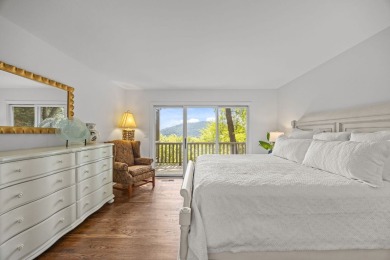 Discover your dream mountain home in the exclusive Club Colony on Lake Toxaway Country Club in North Carolina - for sale on GolfHomes.com, golf home, golf lot
