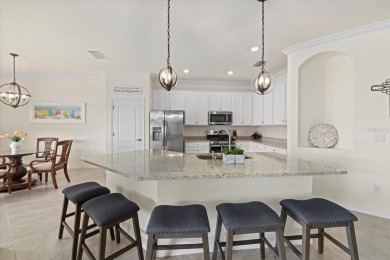 Experience the ultimate backyard paradise in this 4-bedroom on Lakewood National Golf Club in Florida - for sale on GolfHomes.com, golf home, golf lot