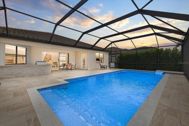 Experience the ultimate backyard paradise in this 4-bedroom on Lakewood National Golf Club in Florida - for sale on GolfHomes.com, golf home, golf lot