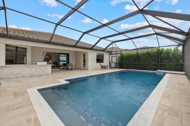 Experience the ultimate backyard paradise in this 4-bedroom on Lakewood National Golf Club in Florida - for sale on GolfHomes.com, golf home, golf lot