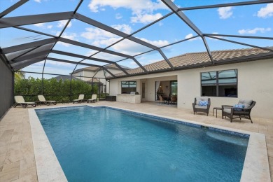 Experience the ultimate backyard paradise in this 4-bedroom on Lakewood National Golf Club in Florida - for sale on GolfHomes.com, golf home, golf lot