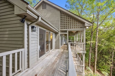 Discover your dream mountain home in the exclusive Club Colony on Lake Toxaway Country Club in North Carolina - for sale on GolfHomes.com, golf home, golf lot