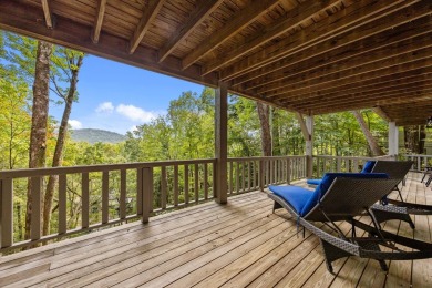 Discover your dream mountain home in the exclusive Club Colony on Lake Toxaway Country Club in North Carolina - for sale on GolfHomes.com, golf home, golf lot