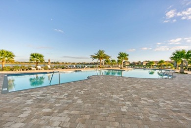 Experience the ultimate backyard paradise in this 4-bedroom on Lakewood National Golf Club in Florida - for sale on GolfHomes.com, golf home, golf lot