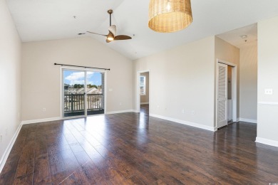 MOTIVATED SELLER! Must see this 2-bedroom/2-bathroom top floor on World Tour Golf Links in South Carolina - for sale on GolfHomes.com, golf home, golf lot